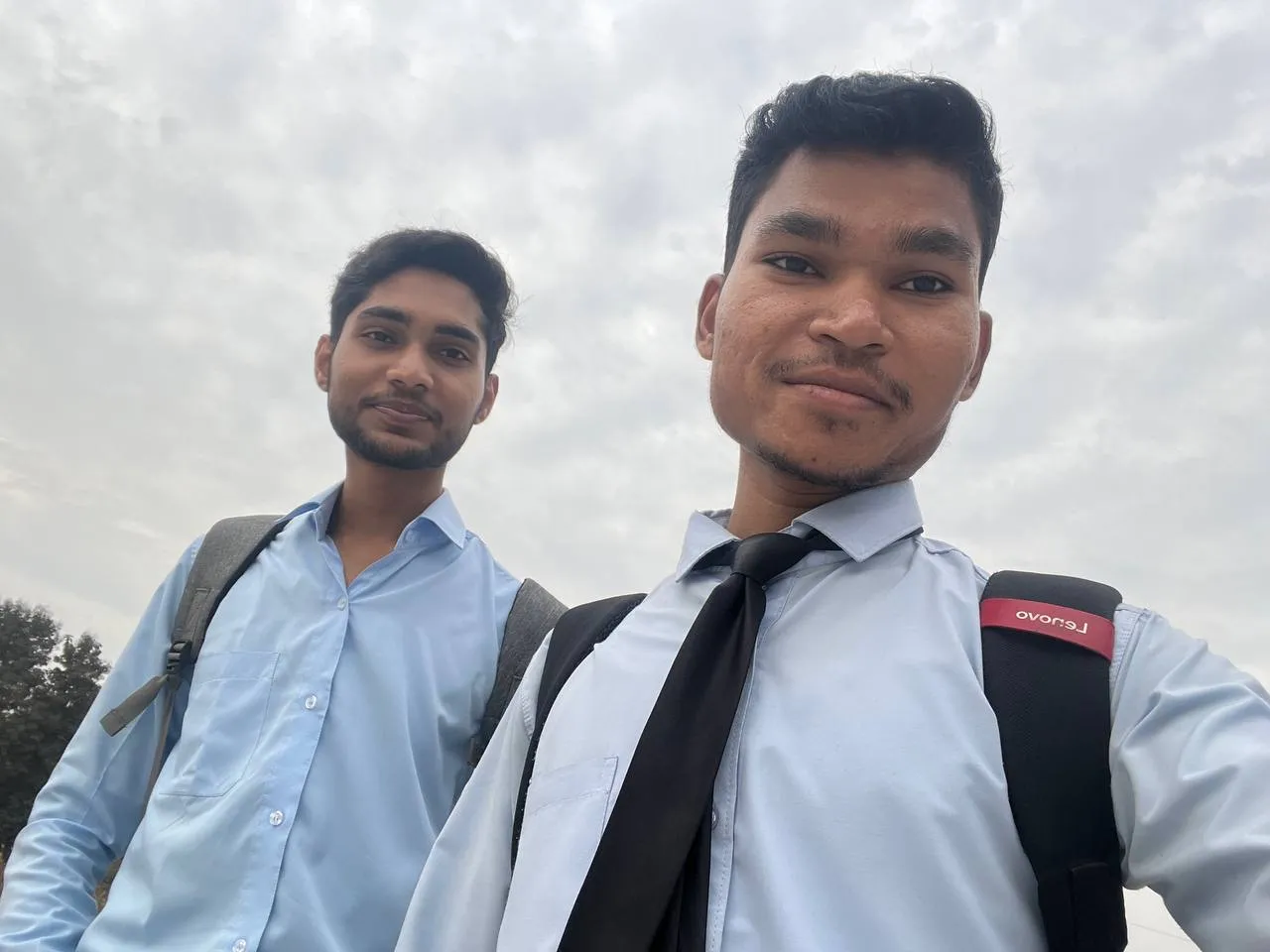 Anas and me in college uniform, walking back from class during MCA